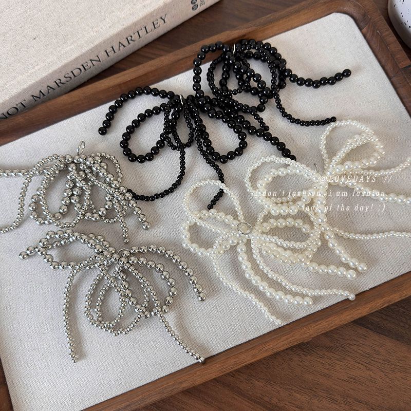 زينة حذاء بفيونكة لؤلؤية وشراب - مراجعة Tie Clip Silver وسعره